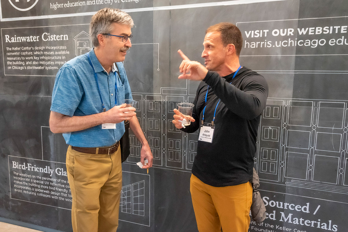 SIOE conference photo: Philip Keefer and John Ahlquist at SIOE 2024.